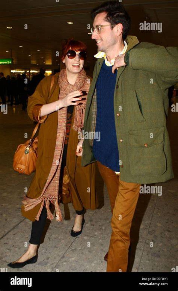 Florence Welch and her boyfriend Stuart Hammond arriving at Heathrow